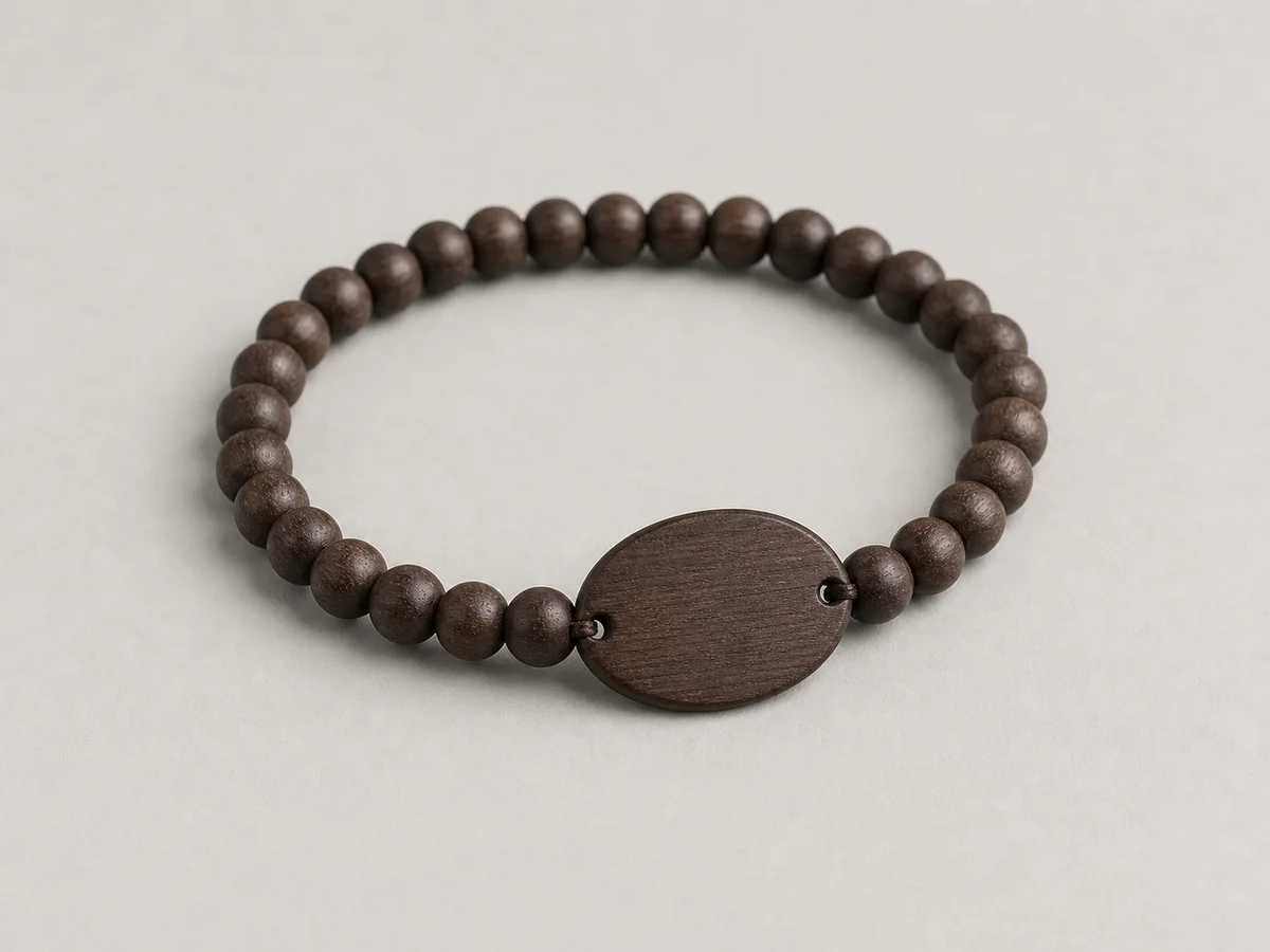 Dark wood-bead RFID wristband with a low-profile walnut faceplate