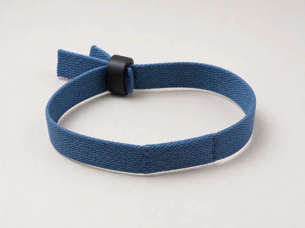 Blue recycled-polyester RFID wristband with a concealed stitched inlay