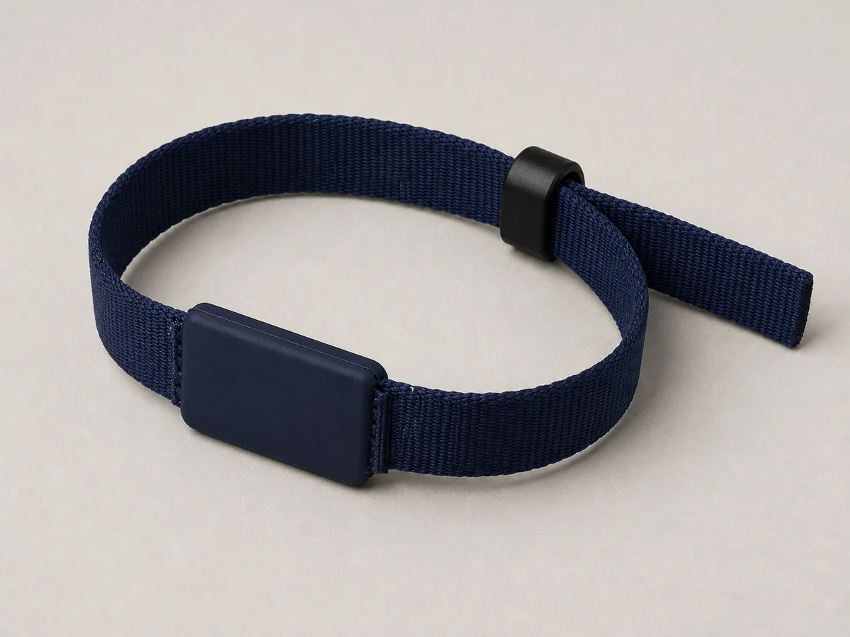 Navy woven RFID wristband with a flat sealed module and one-way adjuster