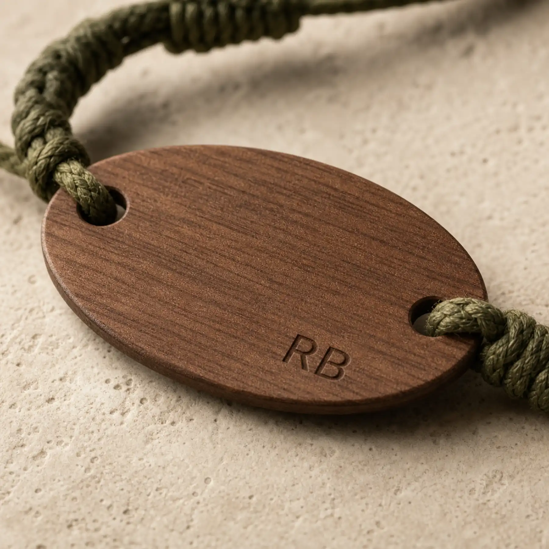 Macro view of a sealed wooden RFID faceplate and cord attachment